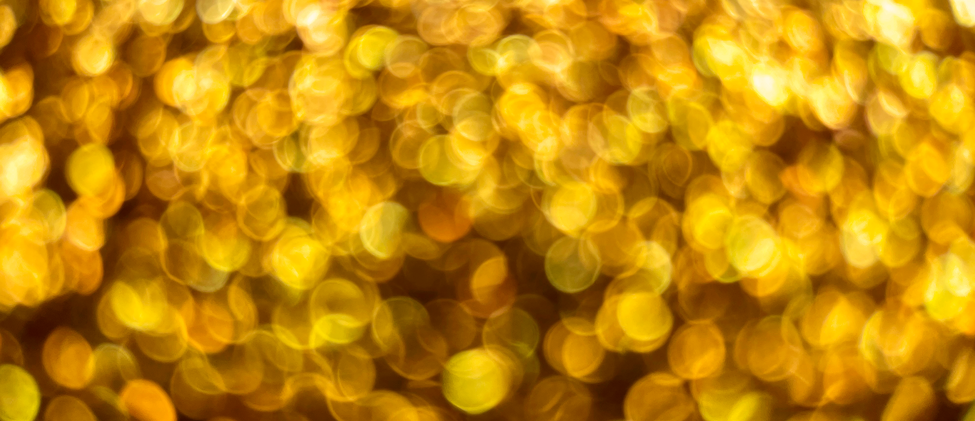 gold-background-with-bokeh-lights-blurry-background